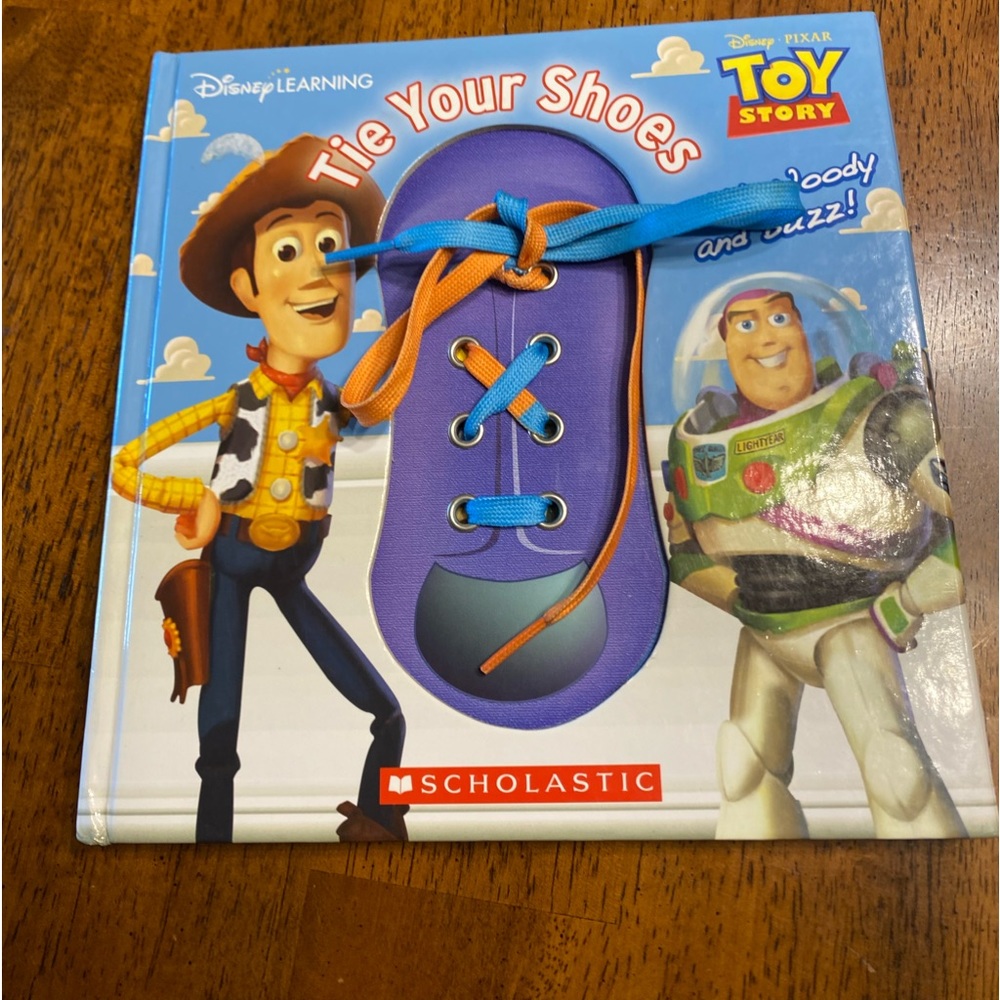 Disney woody and buzz shoe tying book